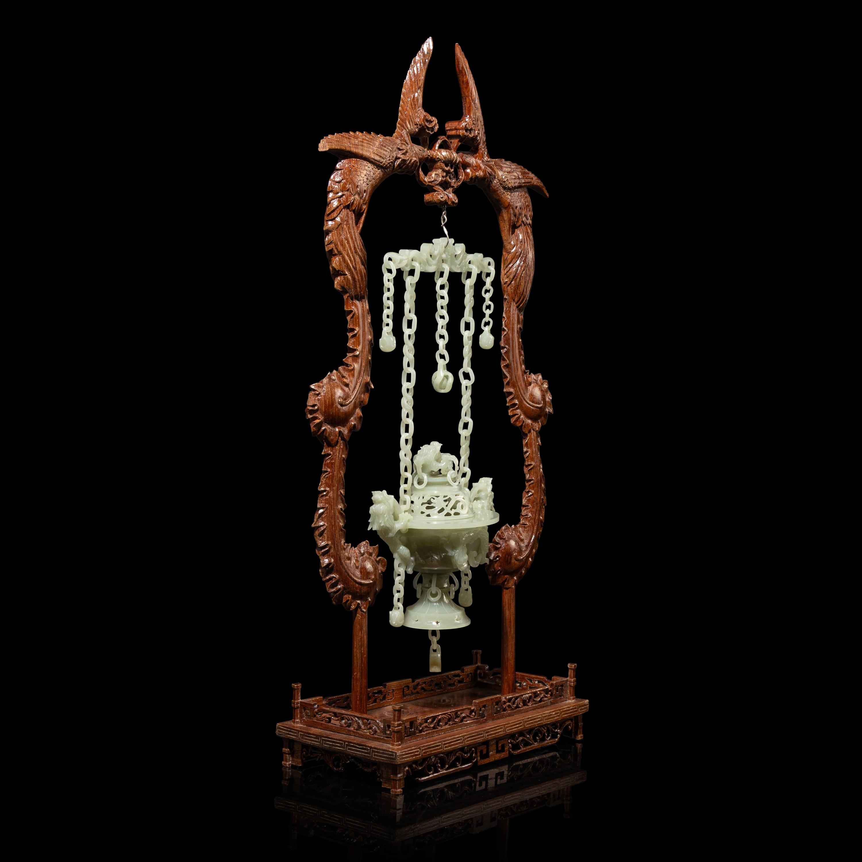 A Chinese Celadon Jade Hanging Incense Burner, 20th Century — 近代 青玉鏈式爐