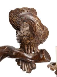 A Black Forest Style Patinated Bronze Chandelier