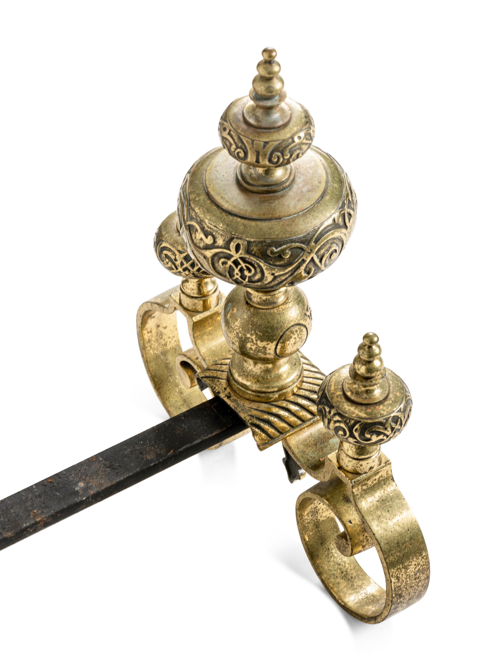 A Pair of Continental Brass Andirons