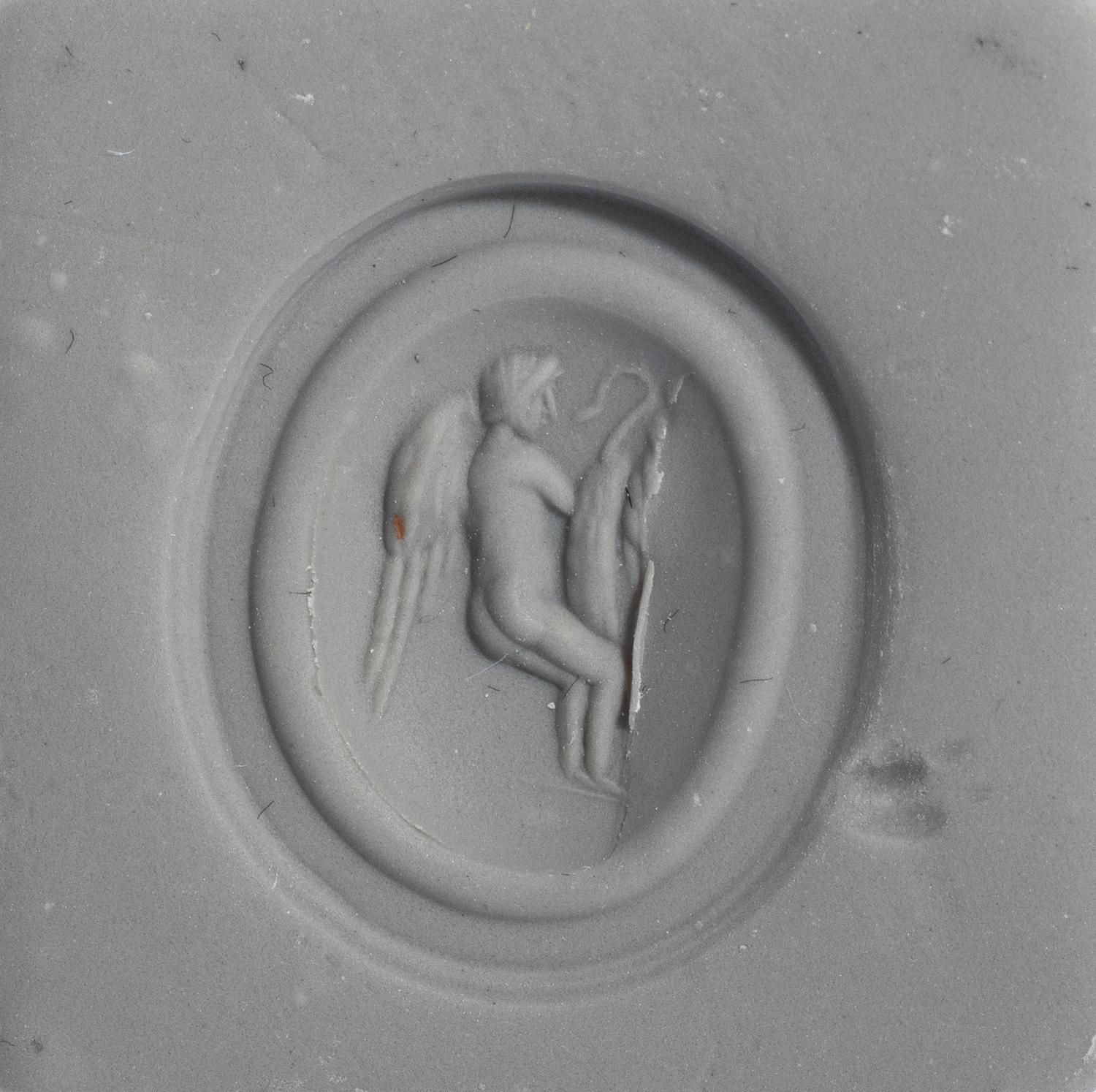 A Roman Carnelian Ring Stone with the God Eros Playing with a Swan — Set in a gold ring