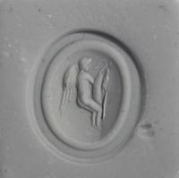 A Roman Carnelian Ring Stone with the God Eros Playing with a Swan — Set in a gold ring