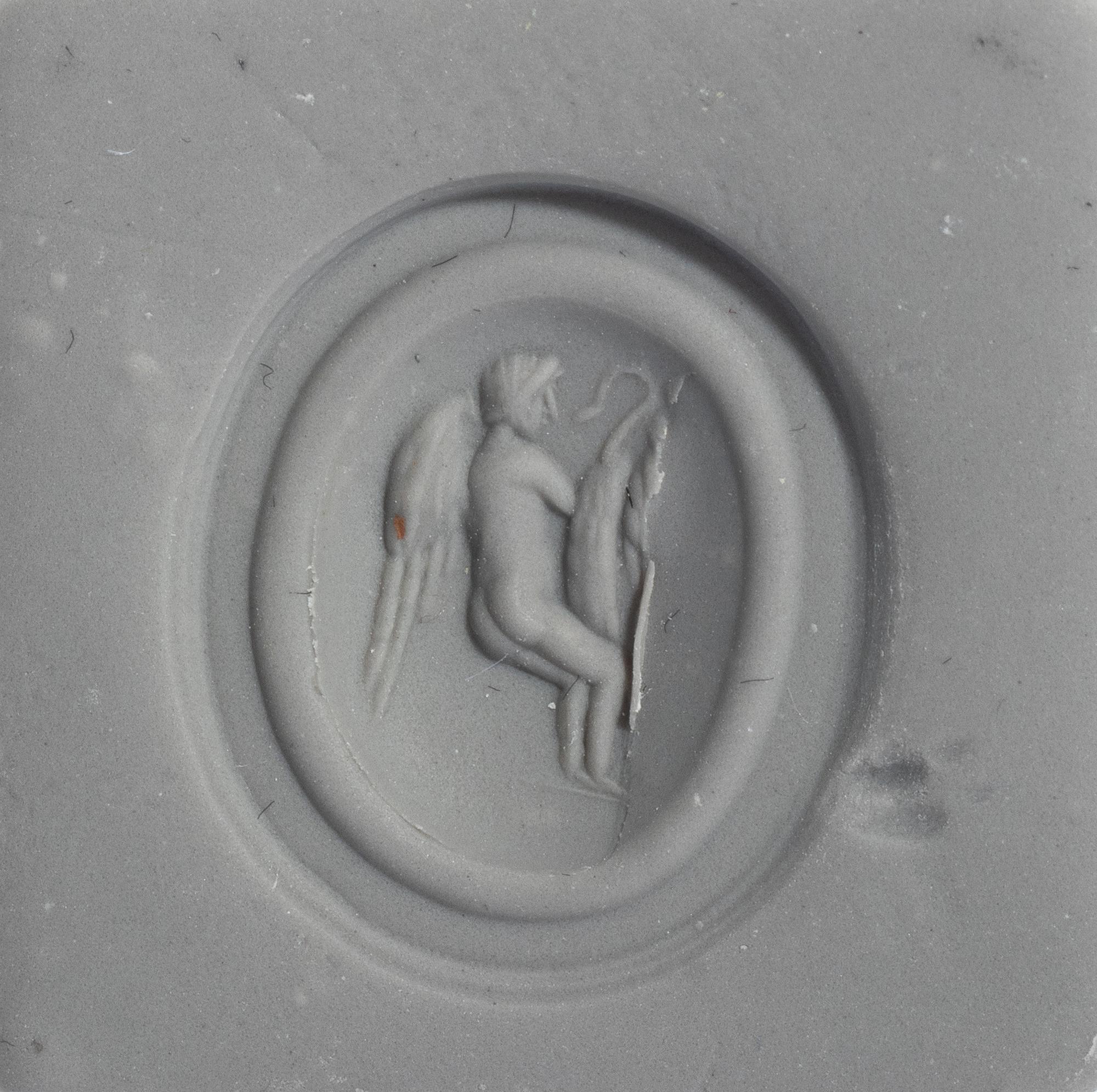 A Roman Carnelian Ring Stone with the God Eros Playing with a Swan — Set in a gold ring