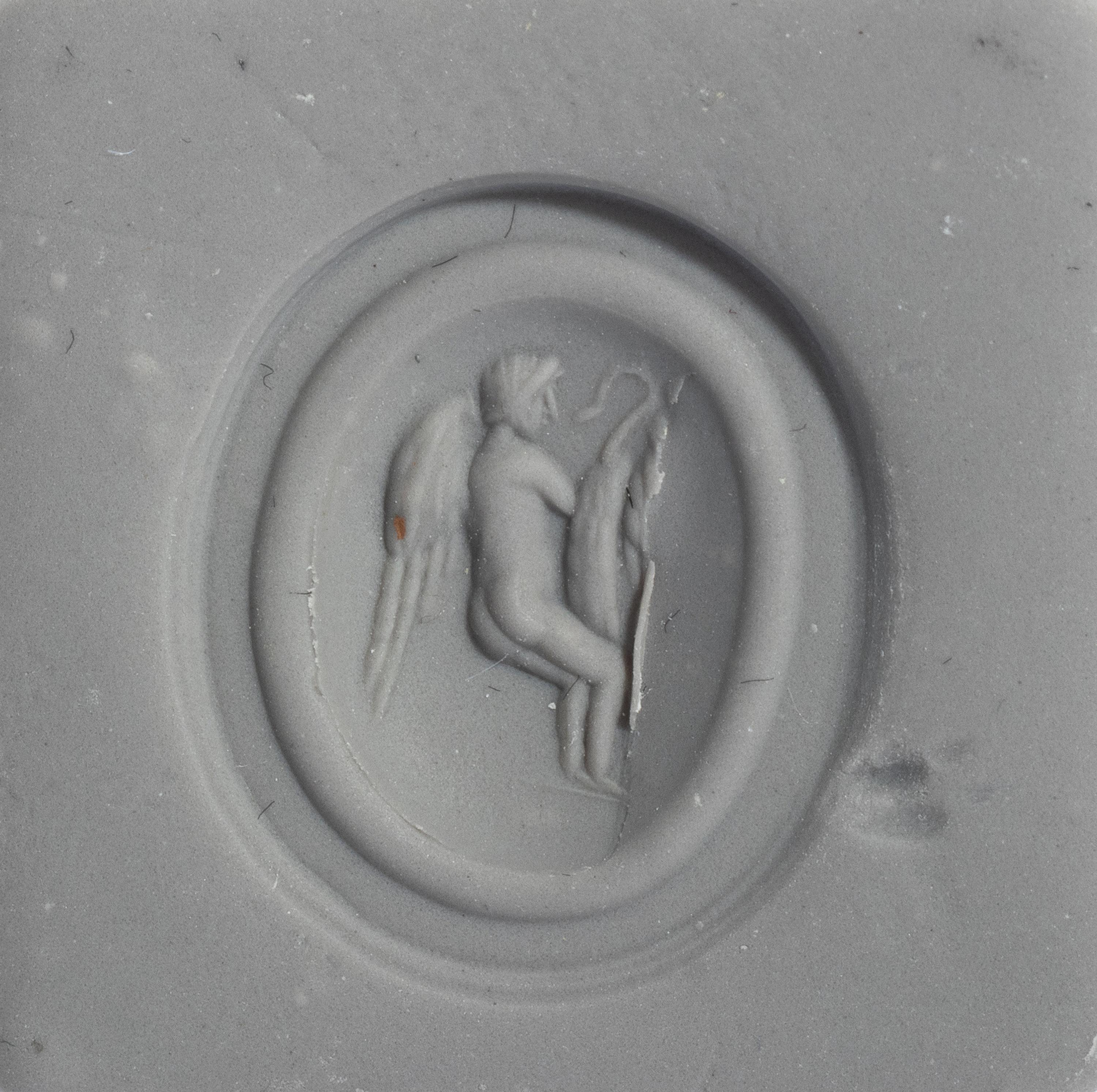 A Roman Carnelian Ring Stone with the God Eros Playing with a Swan — Set in a gold ring