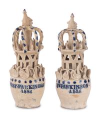 A Pair of Cobalt Decorated Stoneware Puzzle Banks