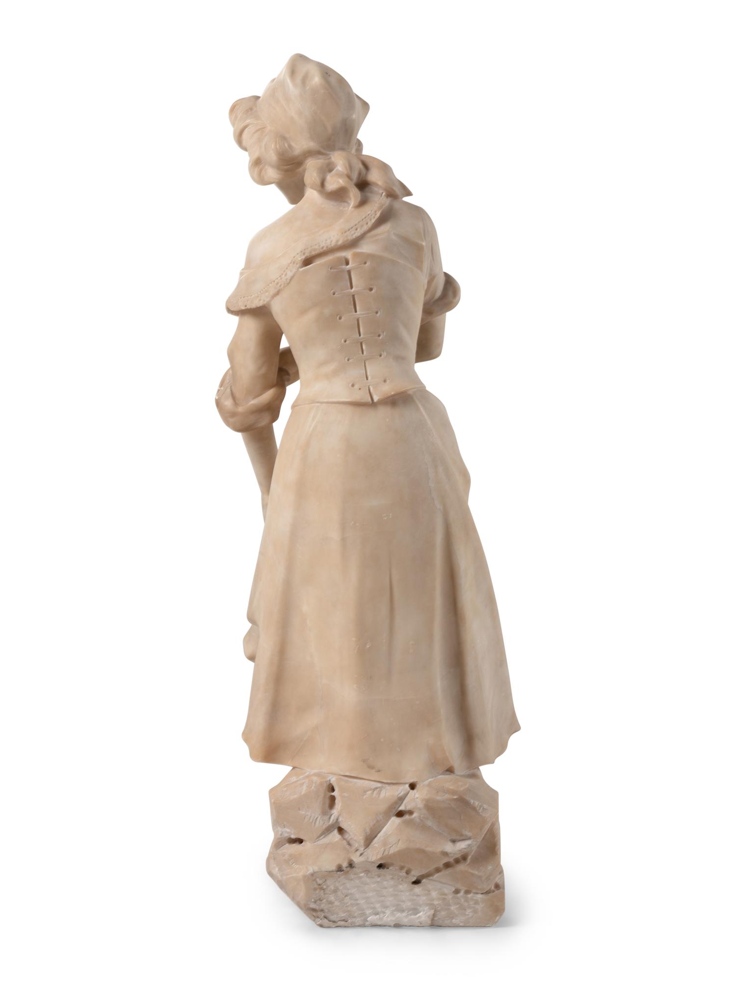 A Continental Carved Alabaster Sculpture