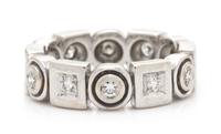 An 18 Karat White Gold and Diamond Eternity Band, Penny Preville, 5.20 dwts.