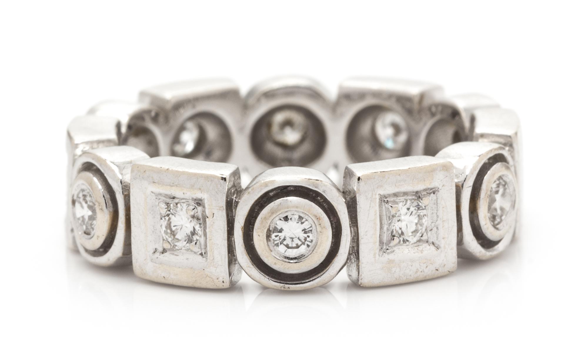 An 18 Karat White Gold and Diamond Eternity Band, Penny Preville, 5.20 dwts.