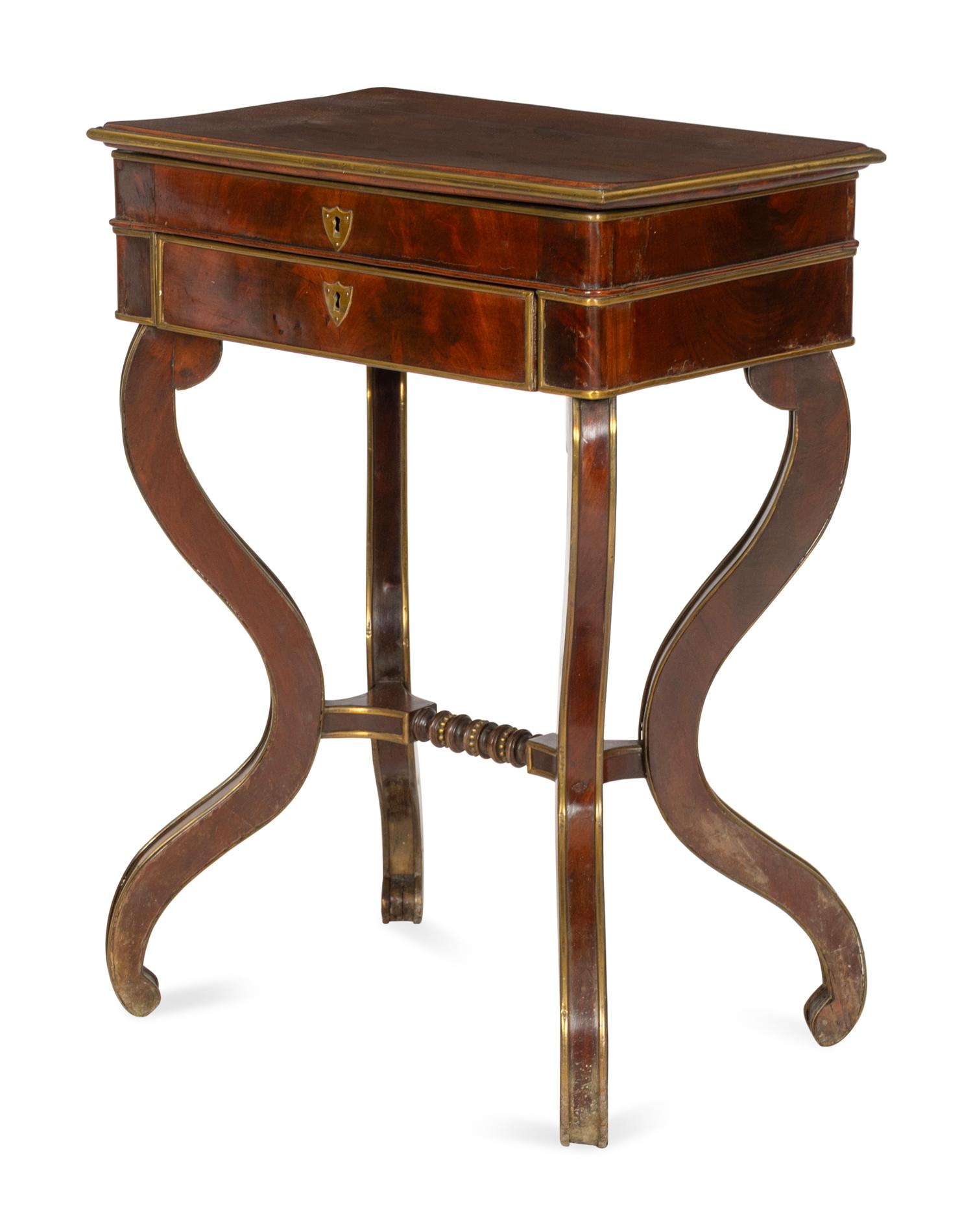 An Italian Mahogany Veneered and Brass Mounted Work Table