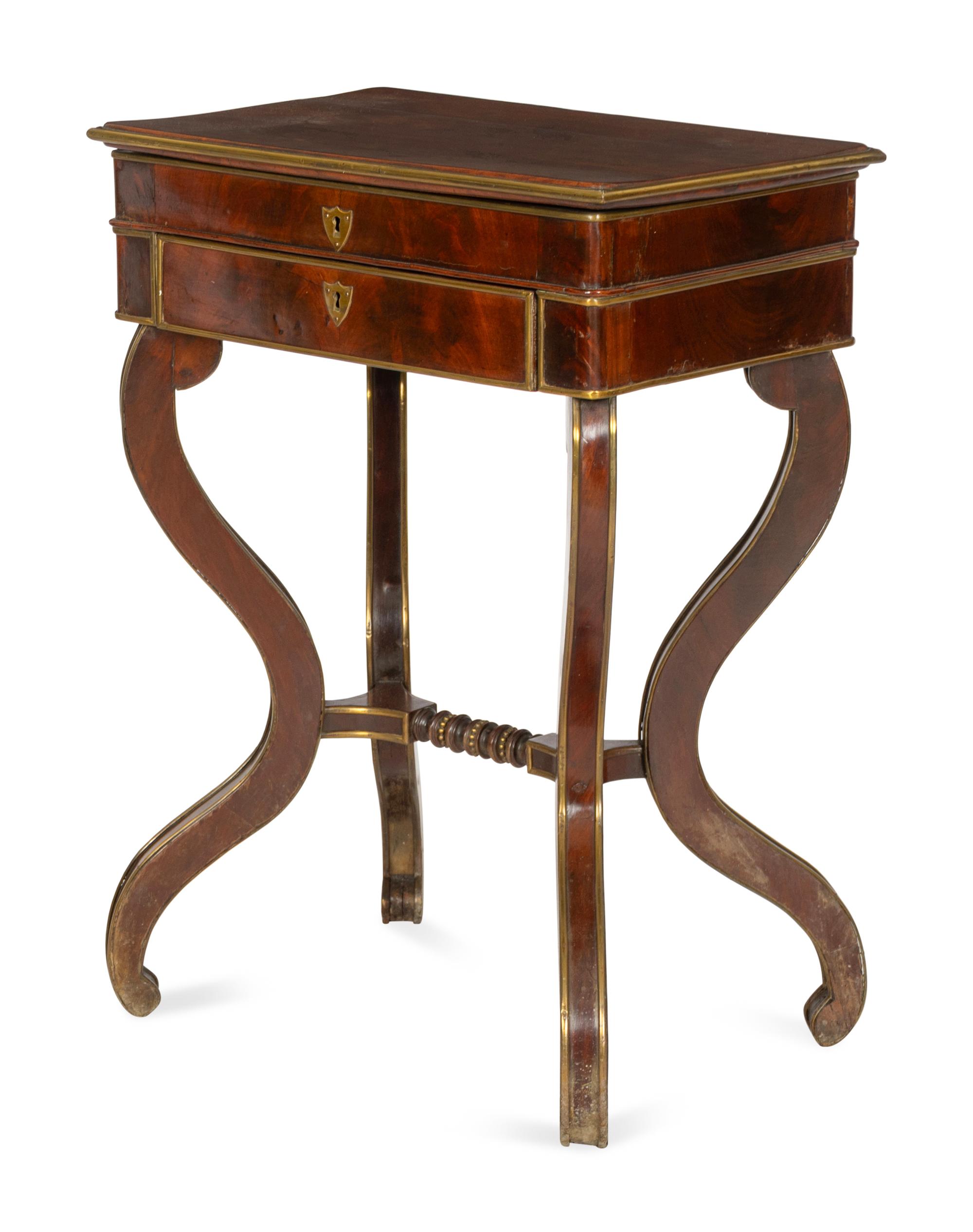 An Italian Mahogany Veneered and Brass Mounted Work Table