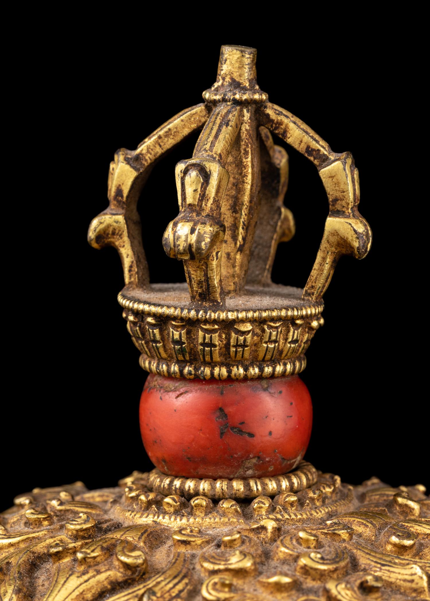 A Tibetan Coral Inset Silver and Gilt Bronze Kapala Bowl