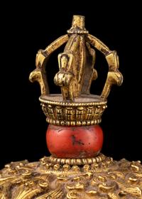 A Tibetan Coral Inset Silver and Gilt Bronze Kapala Bowl