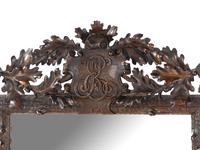 A Black Forest Carved Mirror