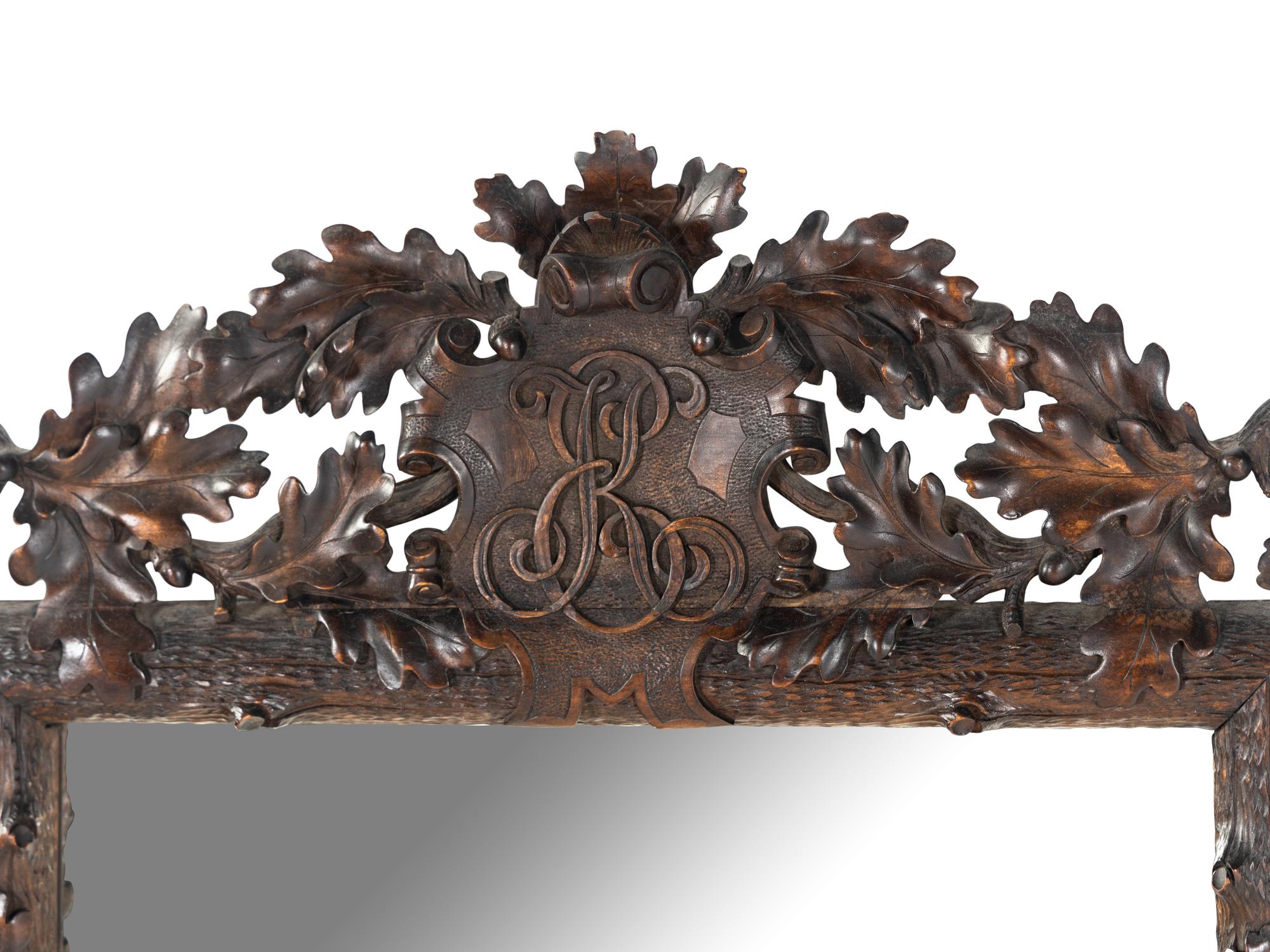 A Black Forest Carved Mirror