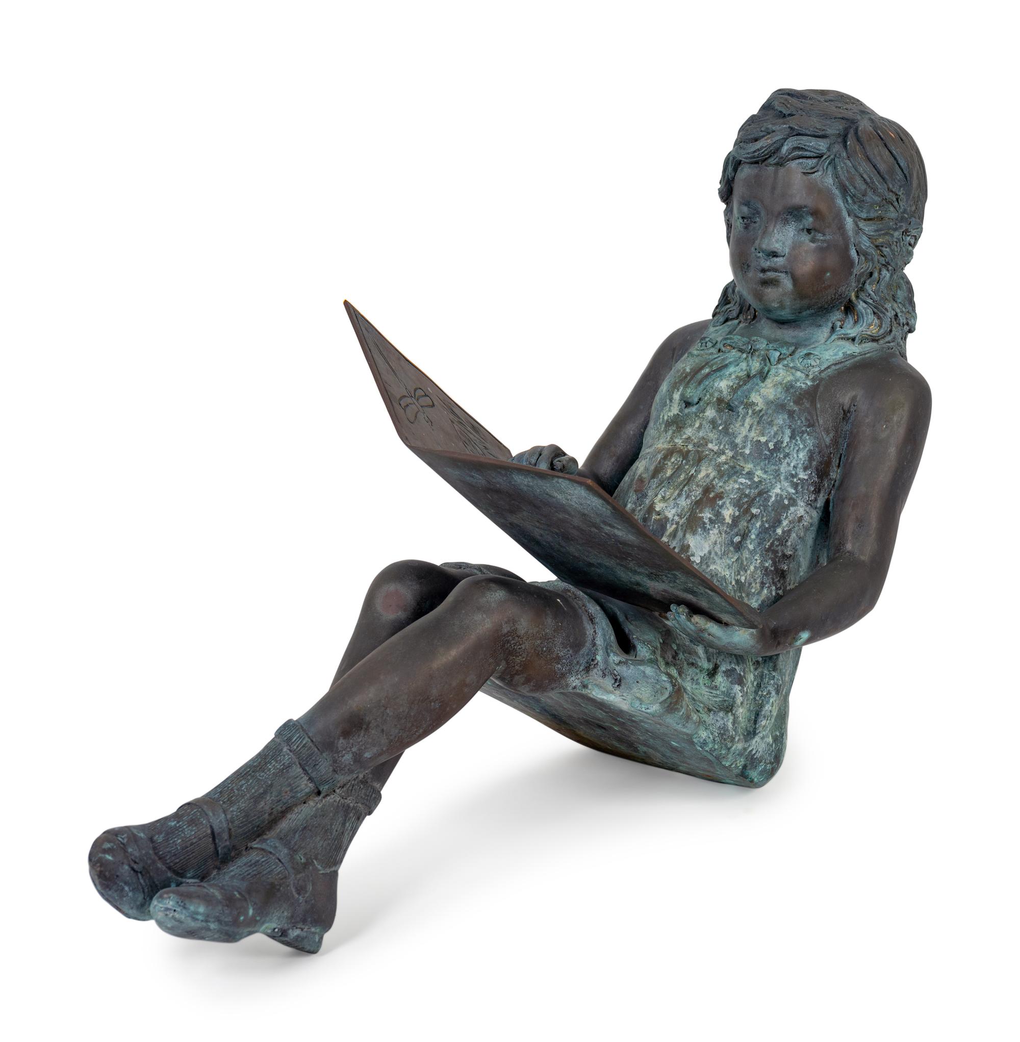 A Bronze Figure of a Young Girl Reading a Book — 20TH CENTURY
