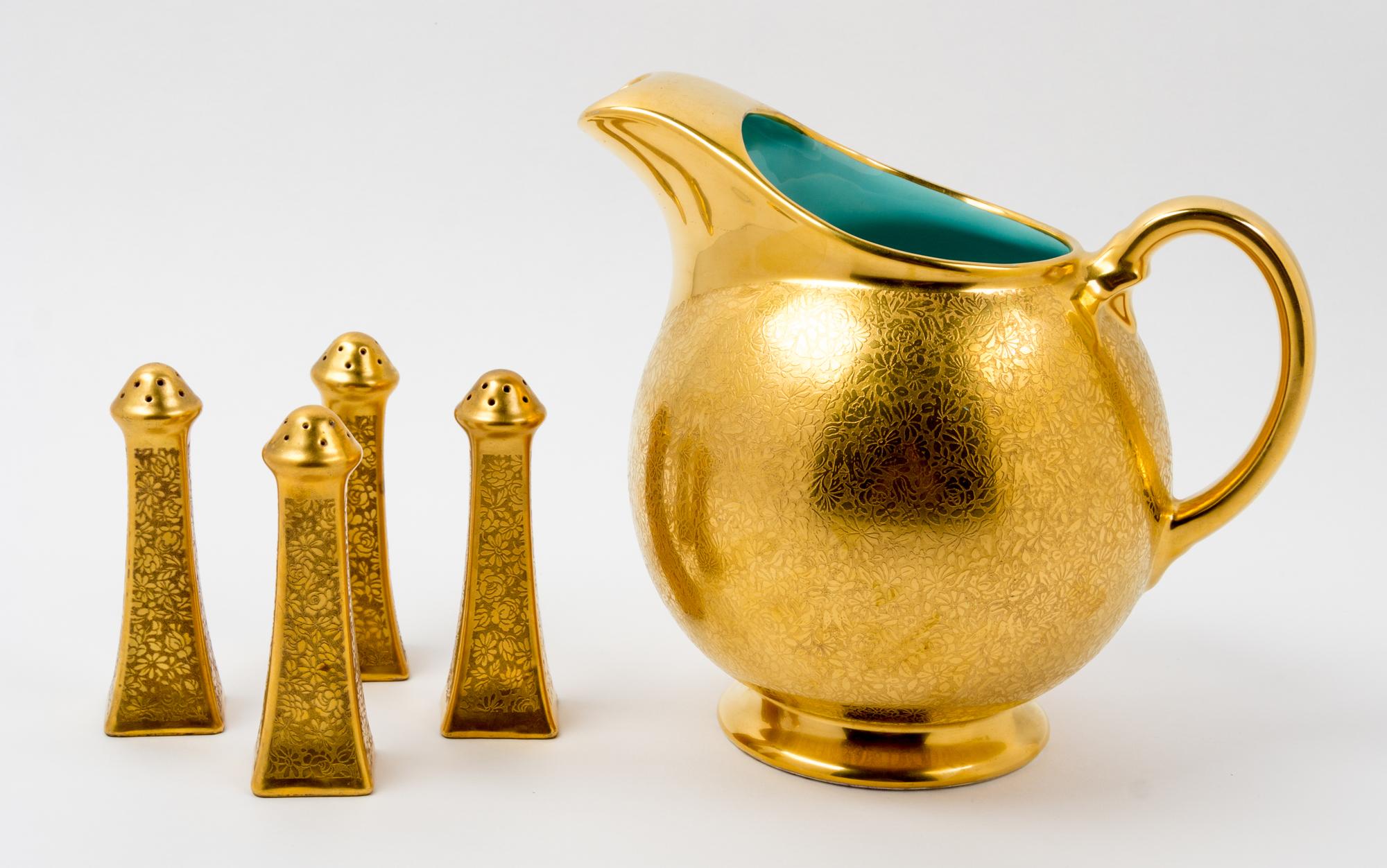 A Gilt Decorated Pitcher Height of pitcher 8 1/4 inches.