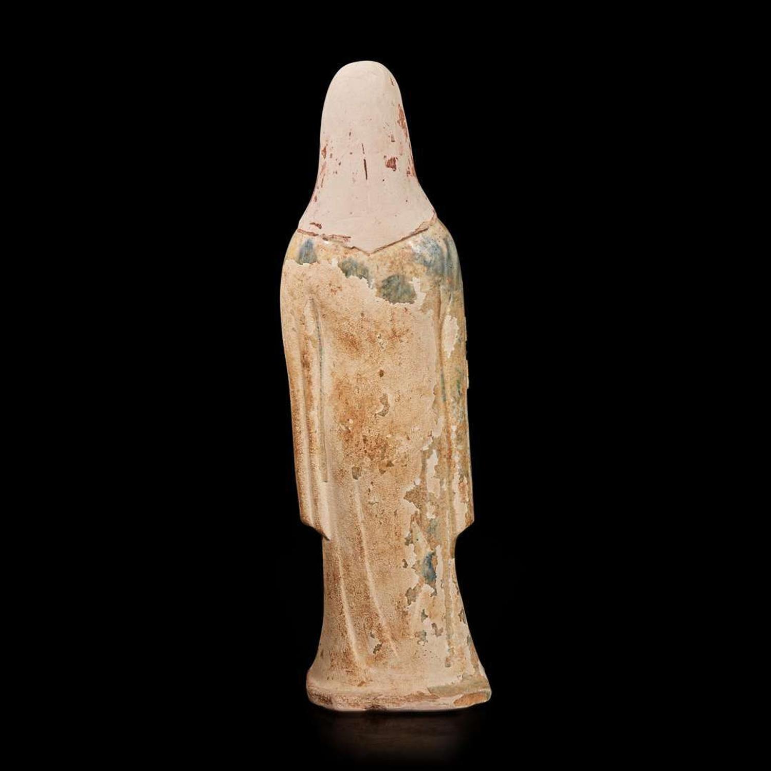 A Chinese sancai-glazed pottery attendant 三彩人物 Probably Tang dynasty ??