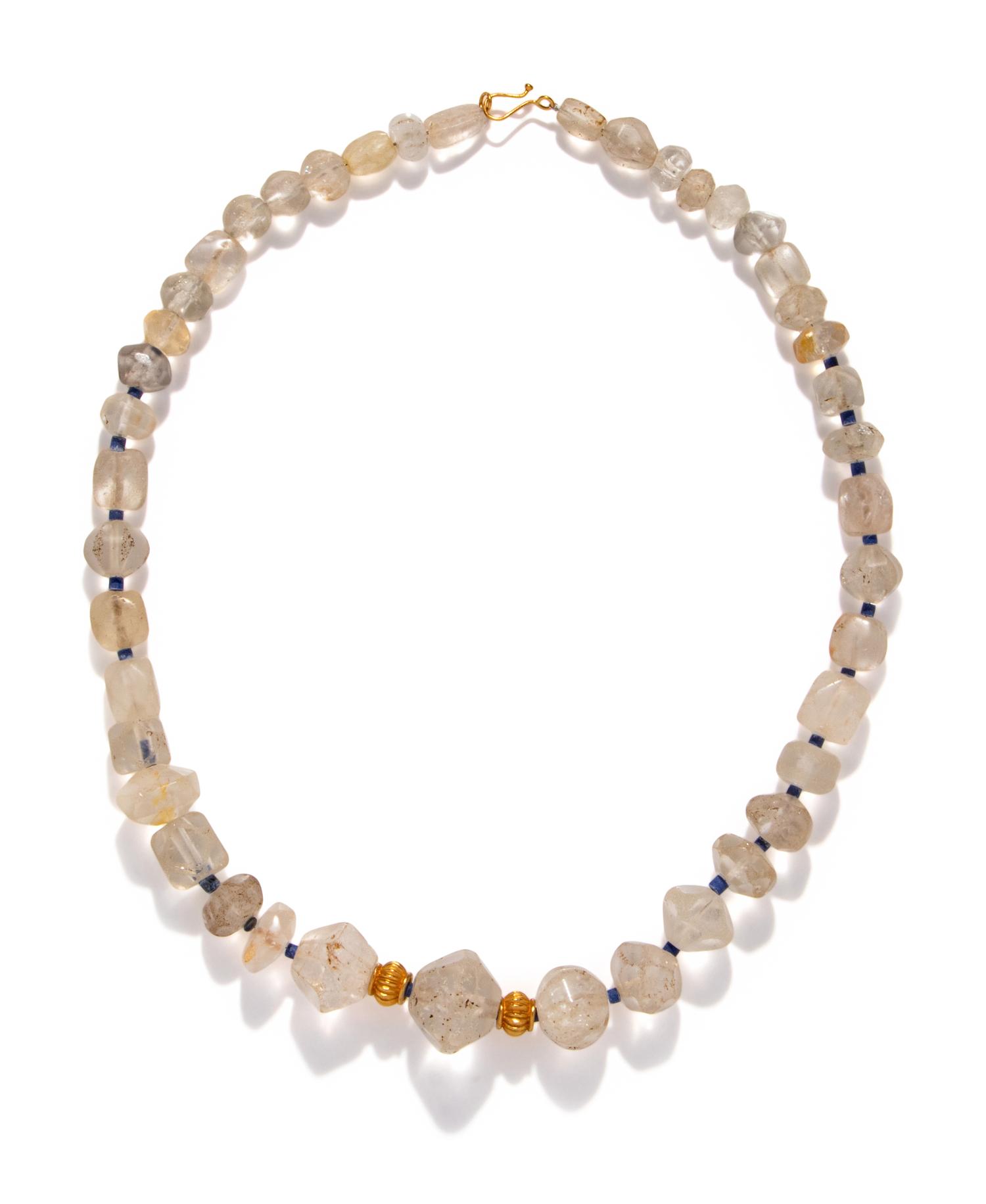 A Western Asiatic Rock Crystal and Gold Bead Necklace