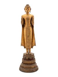A Thai Gilt Bronze Figure of a Standing Buddha — 18TH/19TH CENTURY