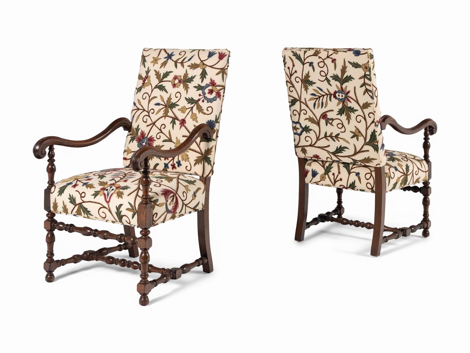 A Pair of William and Mary Style Walnut Armchairs with Crewelwork Upholstery