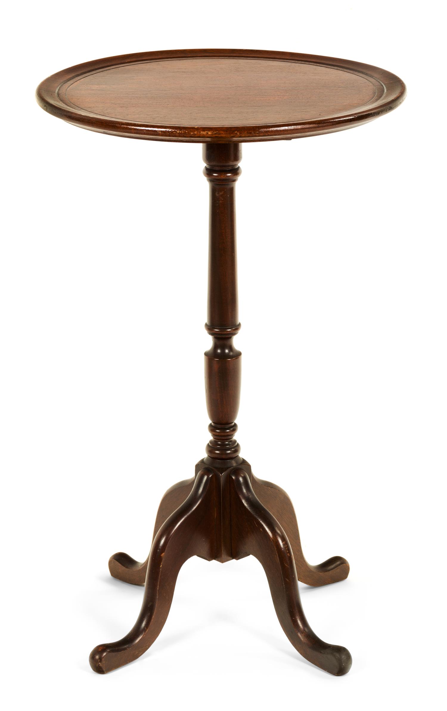 A Georgian Style Mahogany Tripod Table Height 25 1/4 x diameter 15 inches.