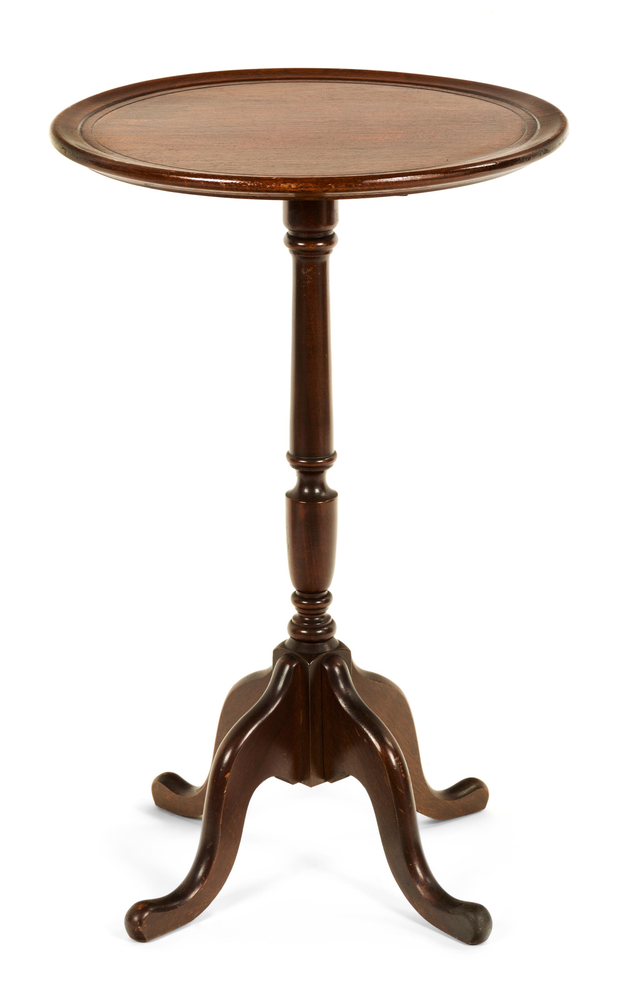 A Georgian Style Mahogany Tripod Table Height 25 1/4 x diameter 15 inches.