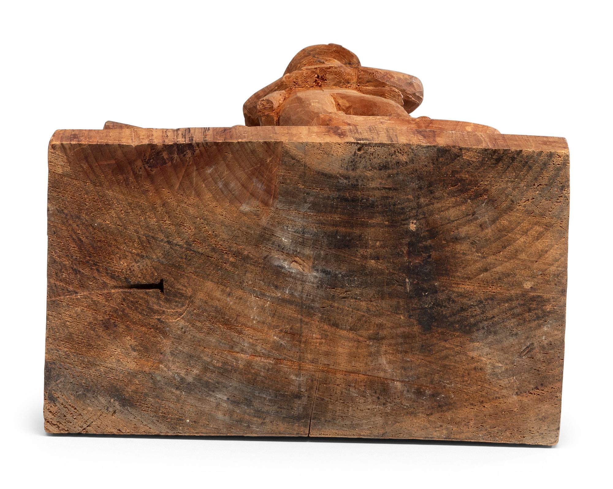 A Folk Art Carved Pine Group of Lumberjacks