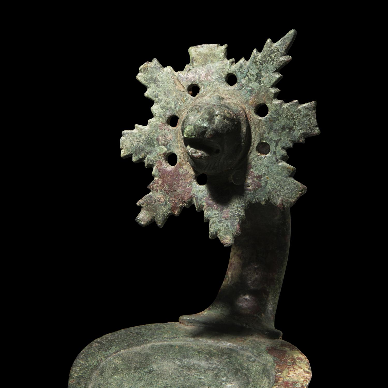 A Roman Bronze Oil Lamp