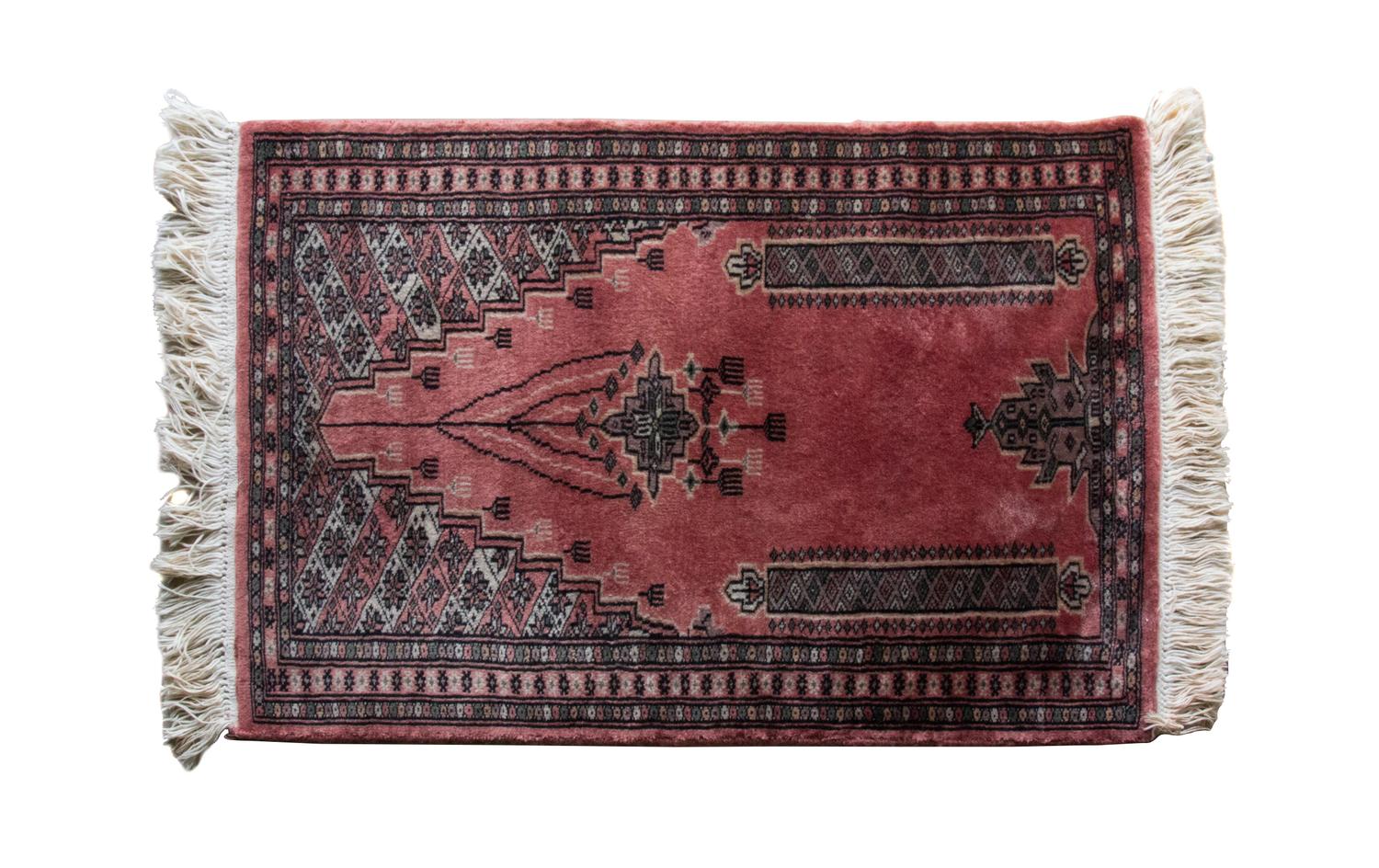 A Persian Sarouk Mat 3 feet 1 inches x 2 feet 1 1/4 inches.