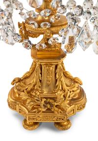 A Pair of French Gilt Bronze and Cut Glass Seven-Light Candelabra