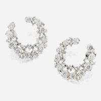 A pair of diamond and white gold earrings