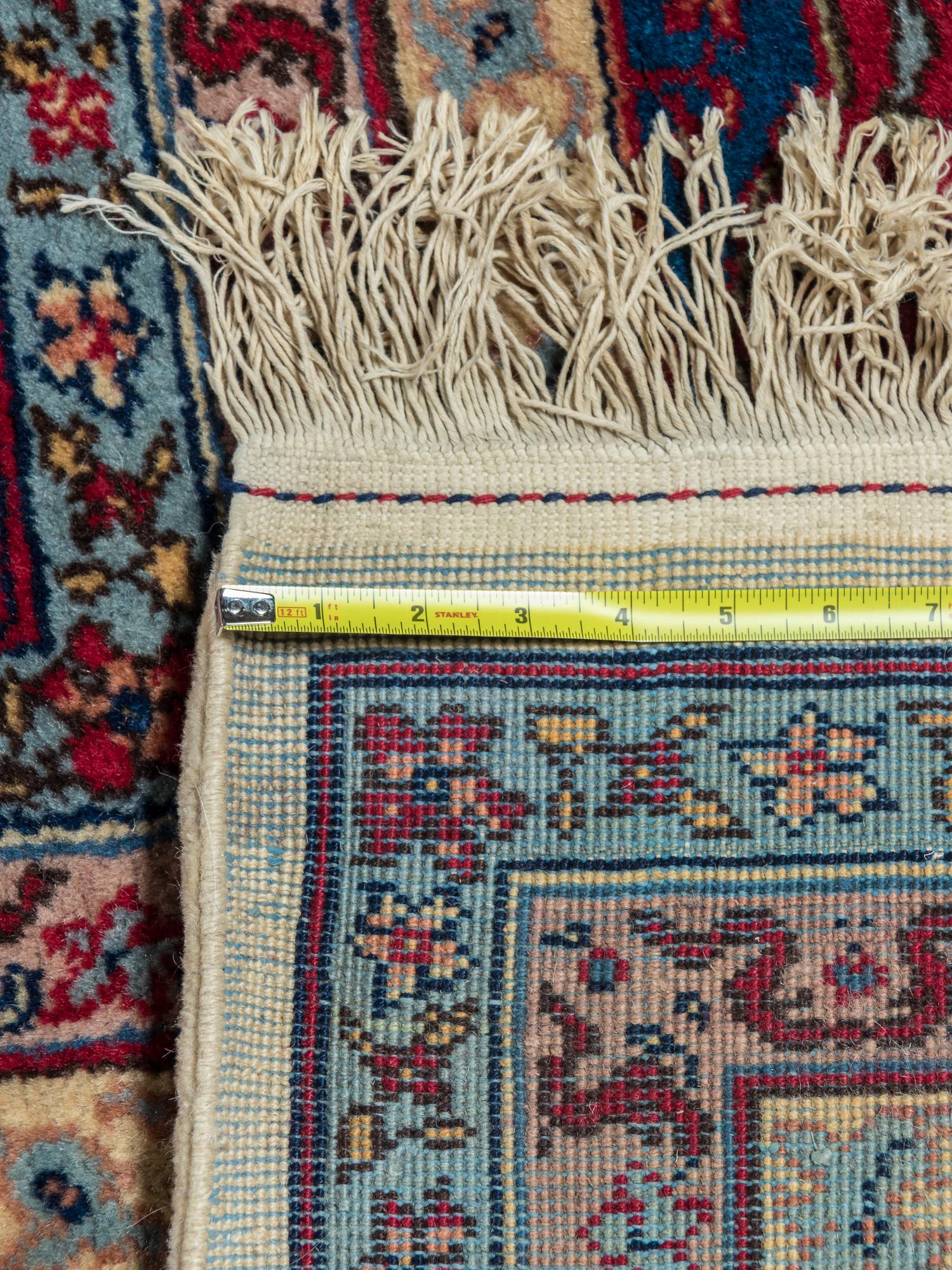 A Tabriz Design Wool Rug