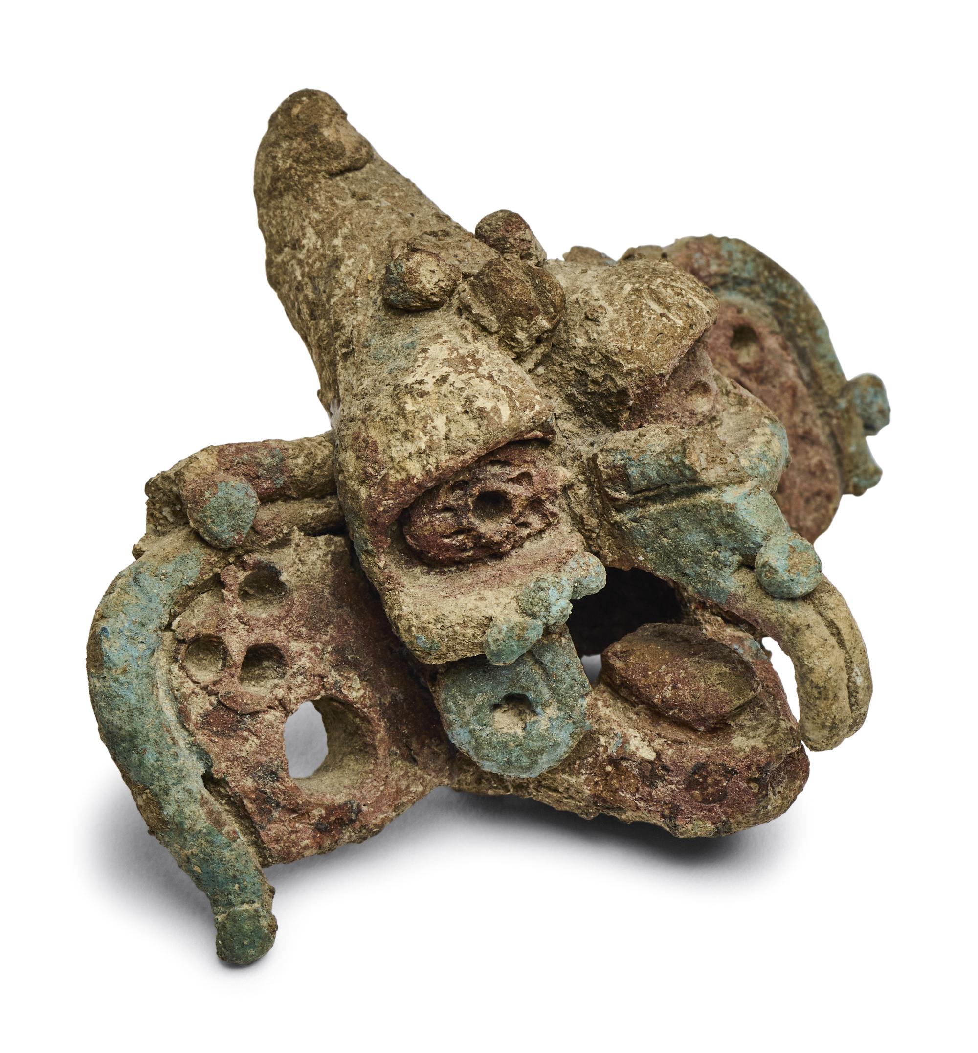 A Maya Polychrome Terracotta Head of a Deity