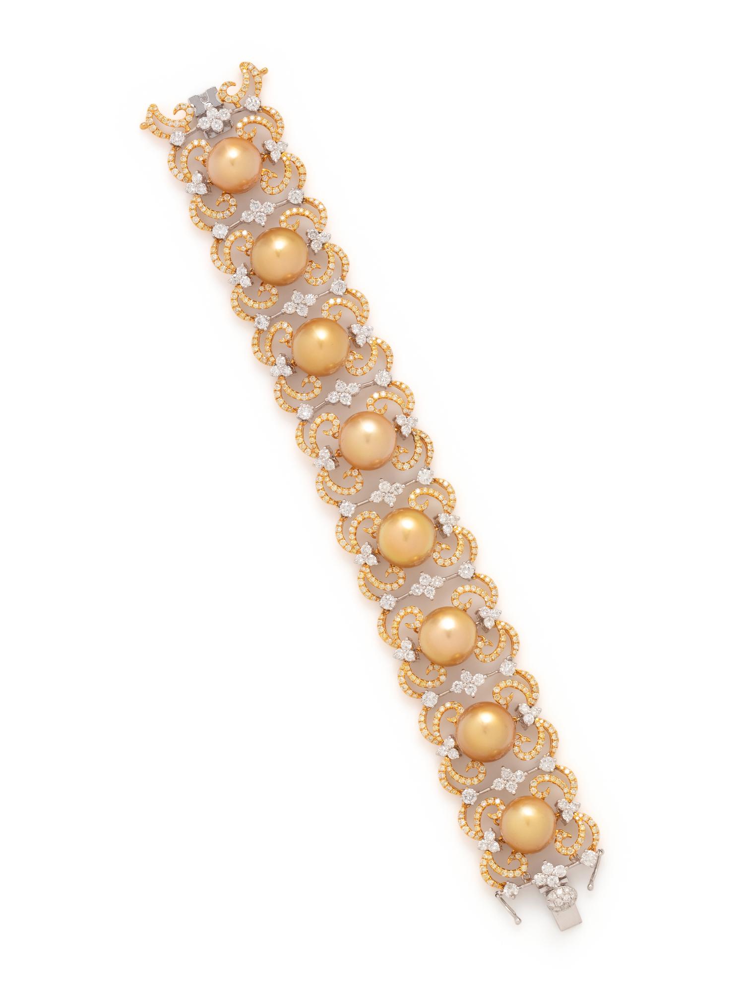 CULTURED GOLDEN SOUTH SEA PEARL, DIAMOND AND COLORED DIAMOND BRACELET