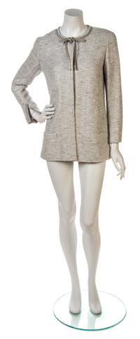 A Chanel Silver Glitter Tweed Jacket, Jacket size 40, top size 40.