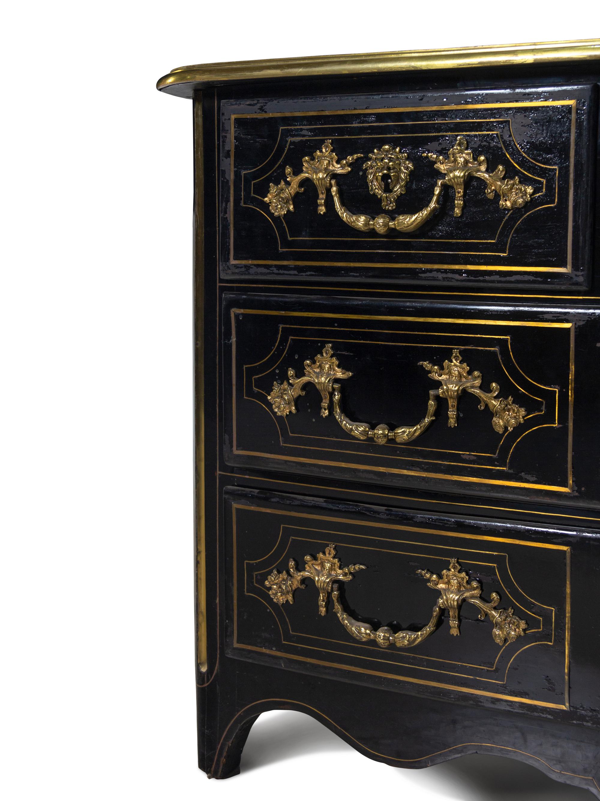 A Régence Gilt Bronze Mounted Ebony Commode