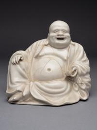 A Blanc-de-Chine Porcelain Figure of Budhai Buddha