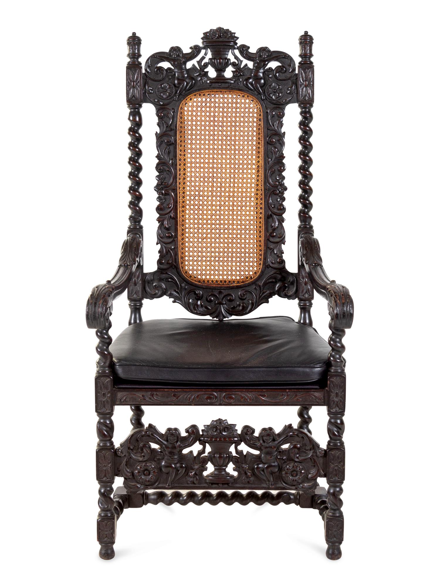 A Renaissance Revival Carved Mahogany Armchair