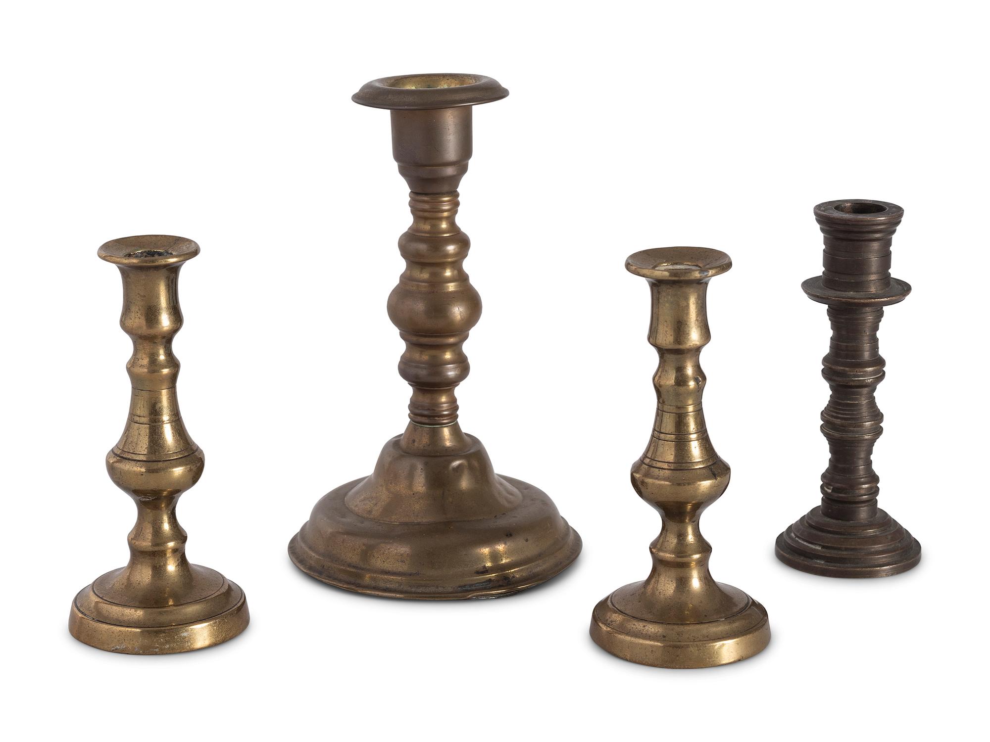 Sixteen English Brass Candlesticks