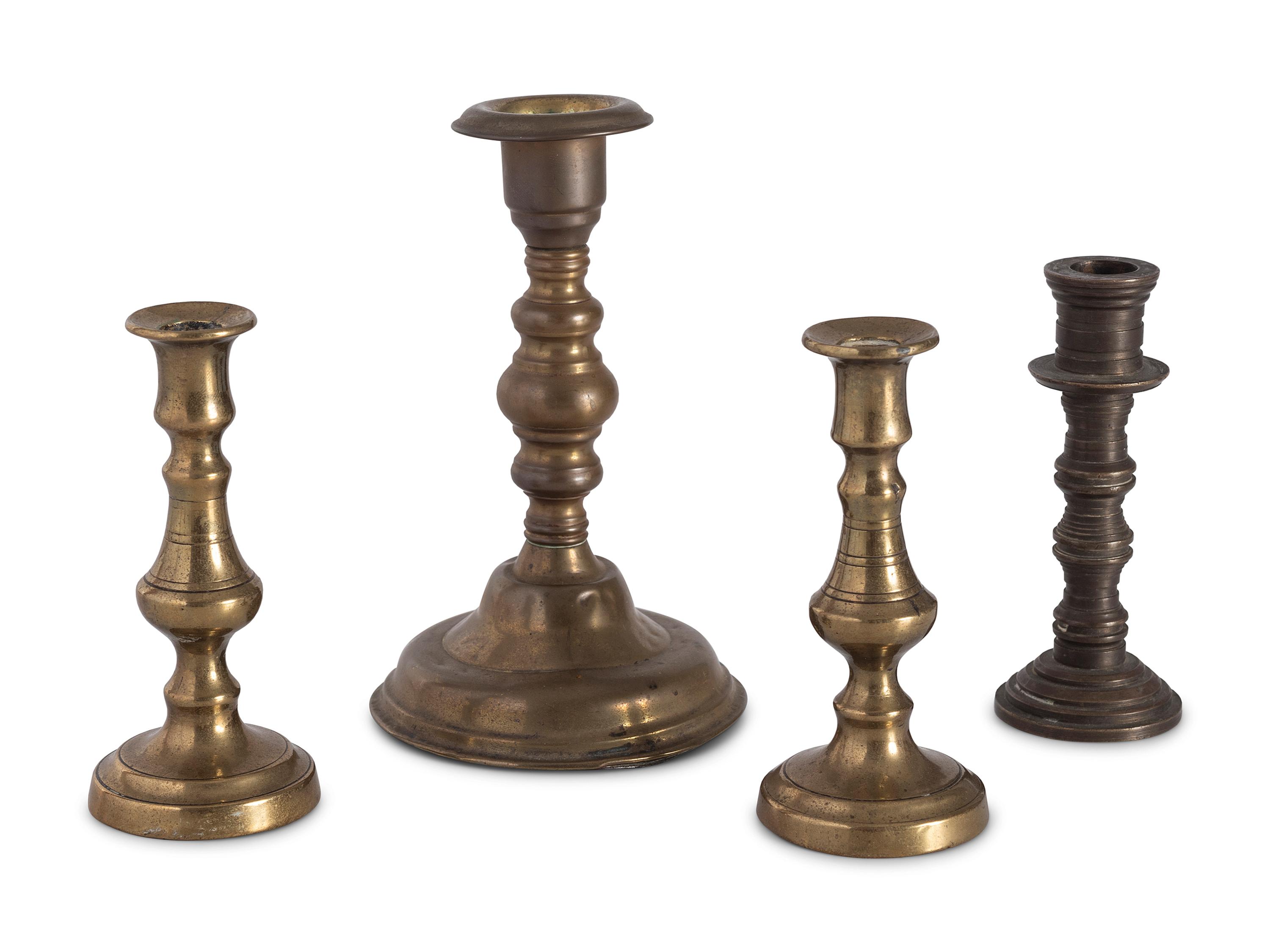 Sixteen English Brass Candlesticks