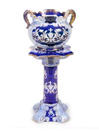 A Flow Blue Double Handled Vase on Stand