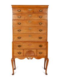 A Queen Anne Figured and Carved Maple Flat-Top High Chest