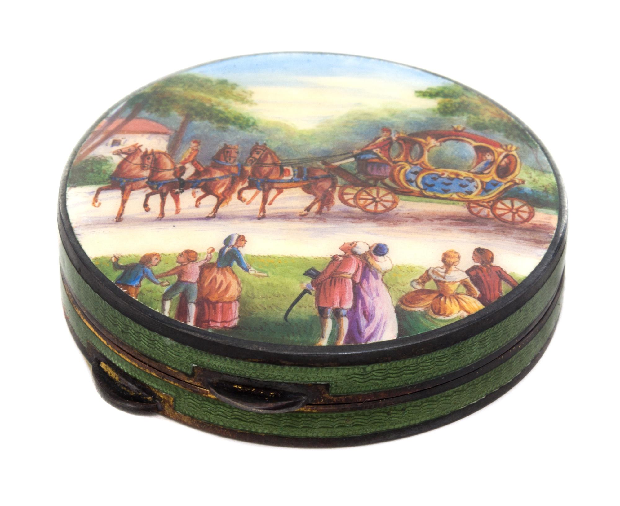 An Austrian Enameled Silver Compact, , of circular form, the lid decorated with a carriage scene, opening to a fitted and mirror inset