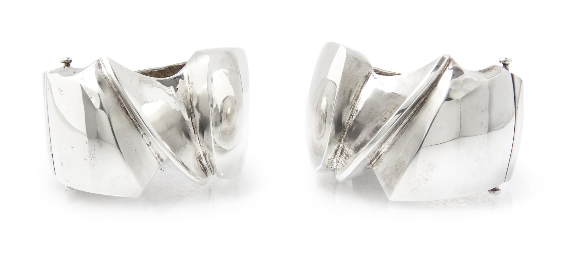 A Pair of Sterling Silver Hinged Cuff Bracelets, Matthew C. Hoffman, 160.70 dwts.