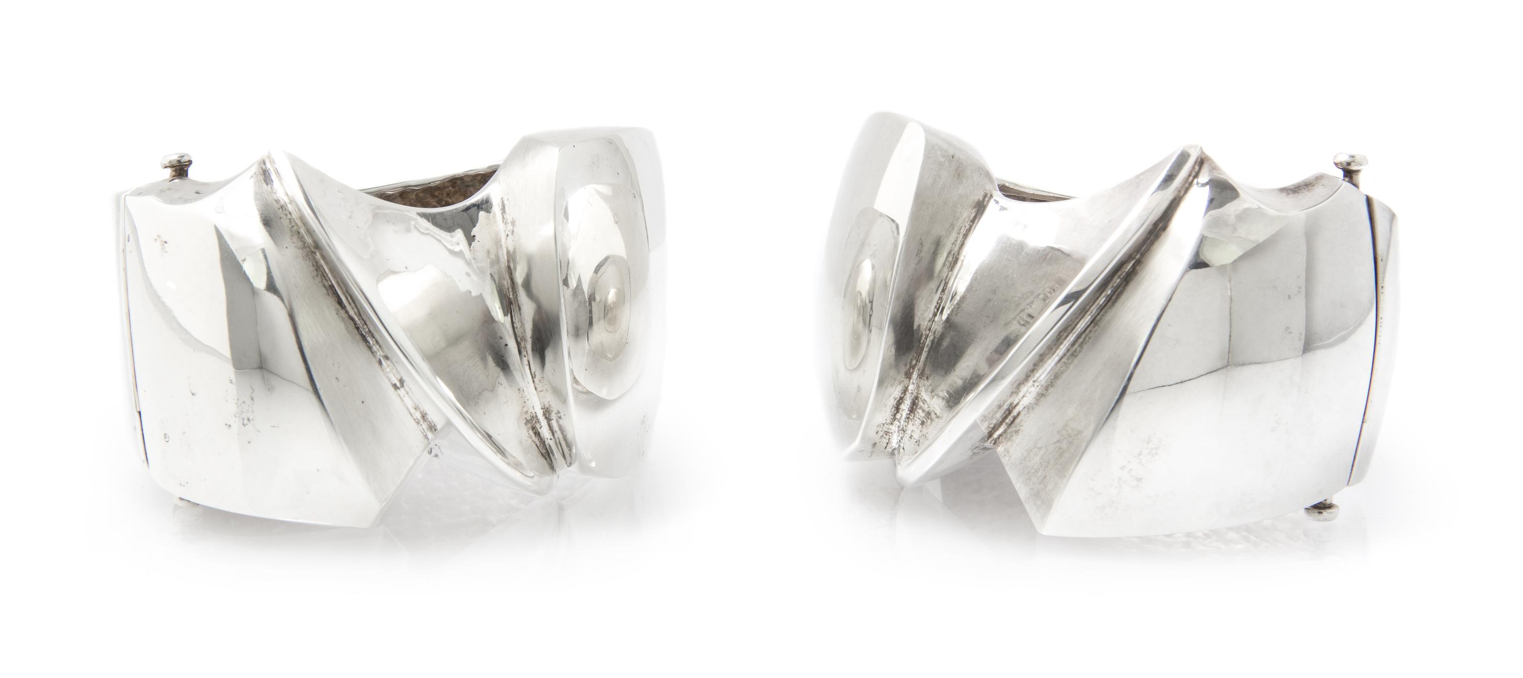 A Pair of Sterling Silver Hinged Cuff Bracelets, Matthew C. Hoffman, 160.70 dwts.