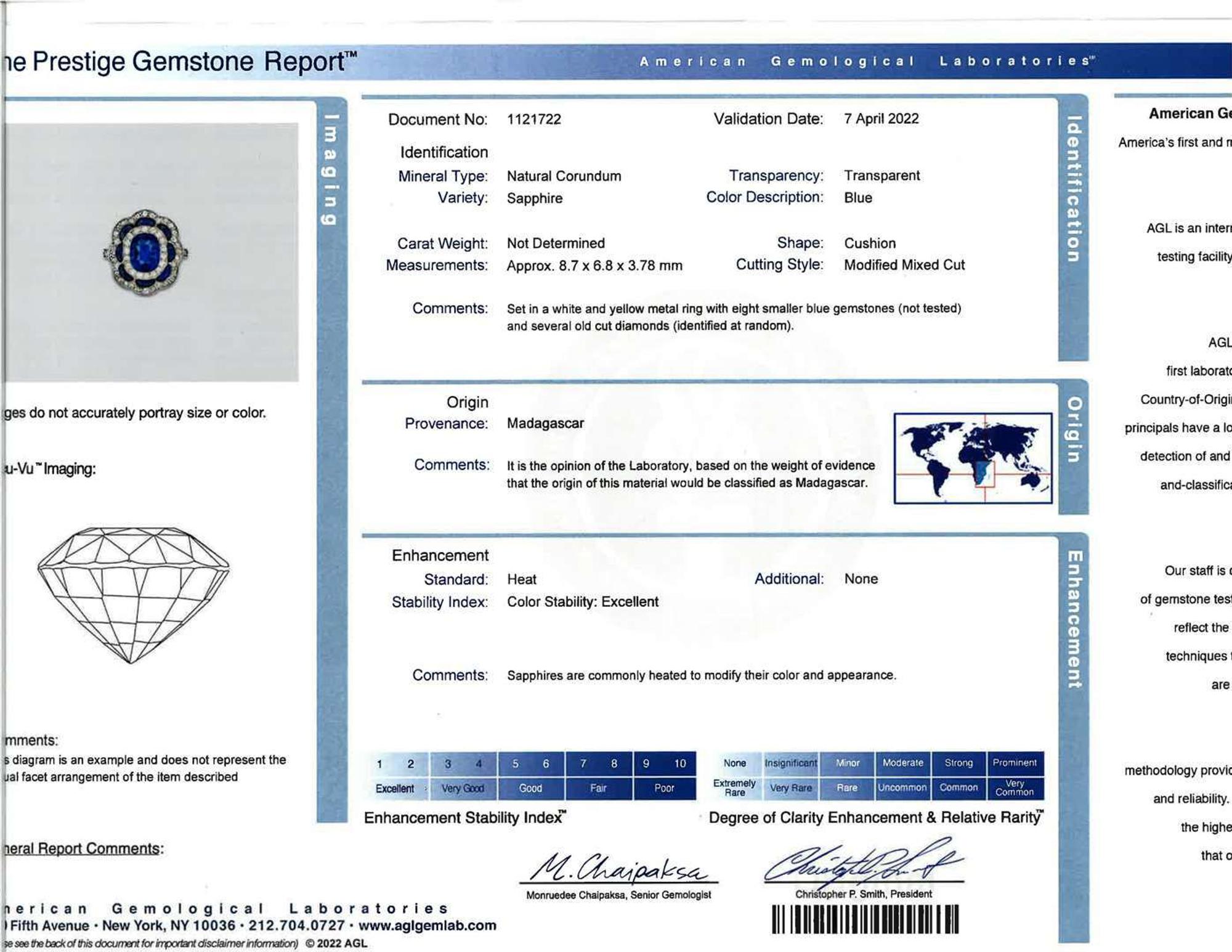 A sapphire, diamond, and platinum topped gold ring