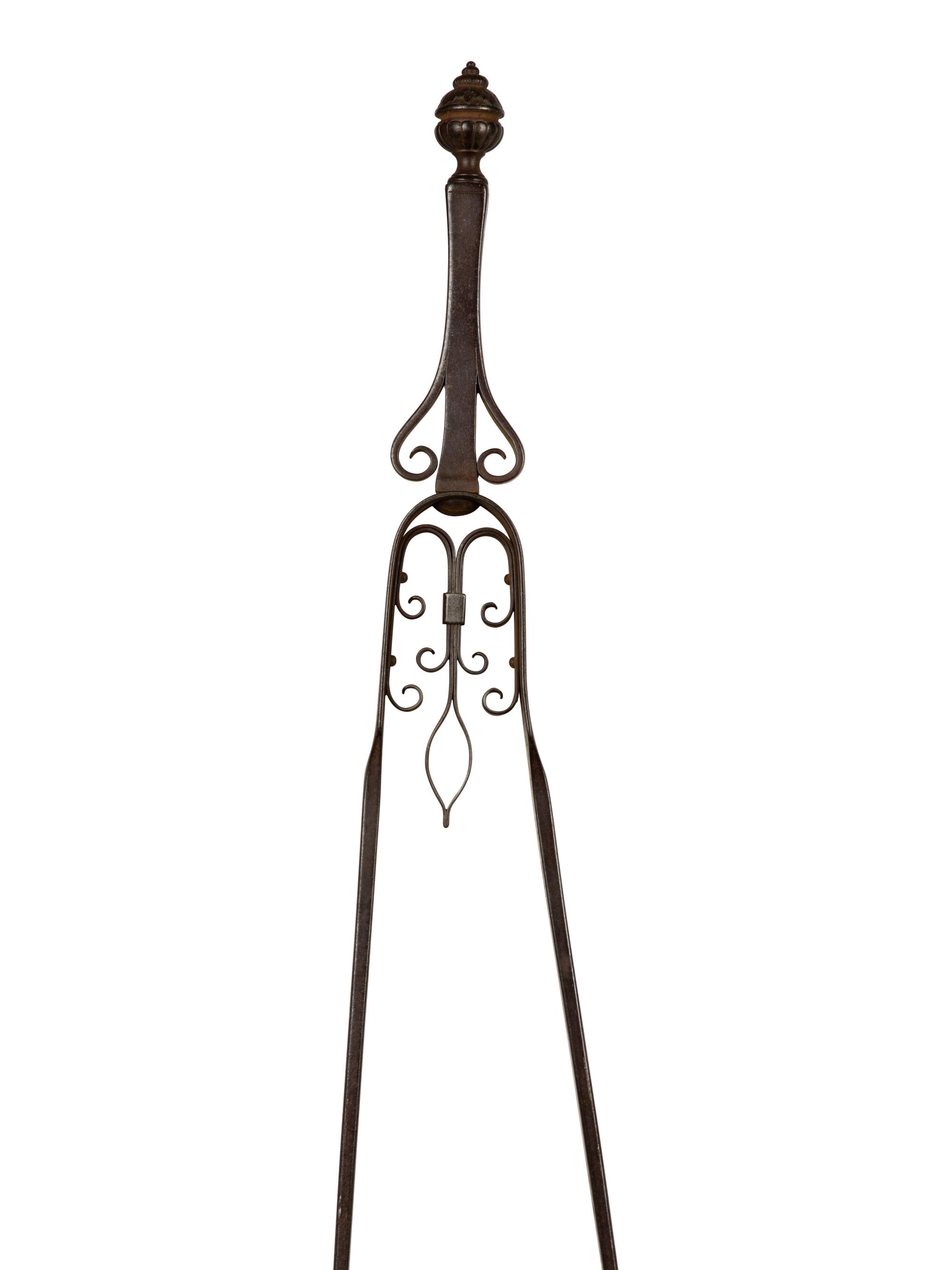 A Set of Continental Wrought Iron Fire Tools with a Pair of Tool Stands — 19TH CENTURY