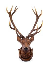 A Black Forest Carved Stag Head