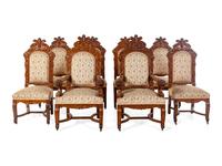 A Set of Eight Renaissance Revival Carved Oak Dining Chairs