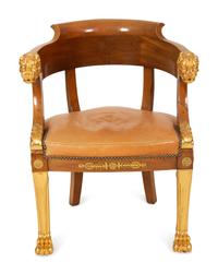 An Empire Gilt Bronze Mounted Mahogany and Parcel Gilt Fauteuil de Bureau