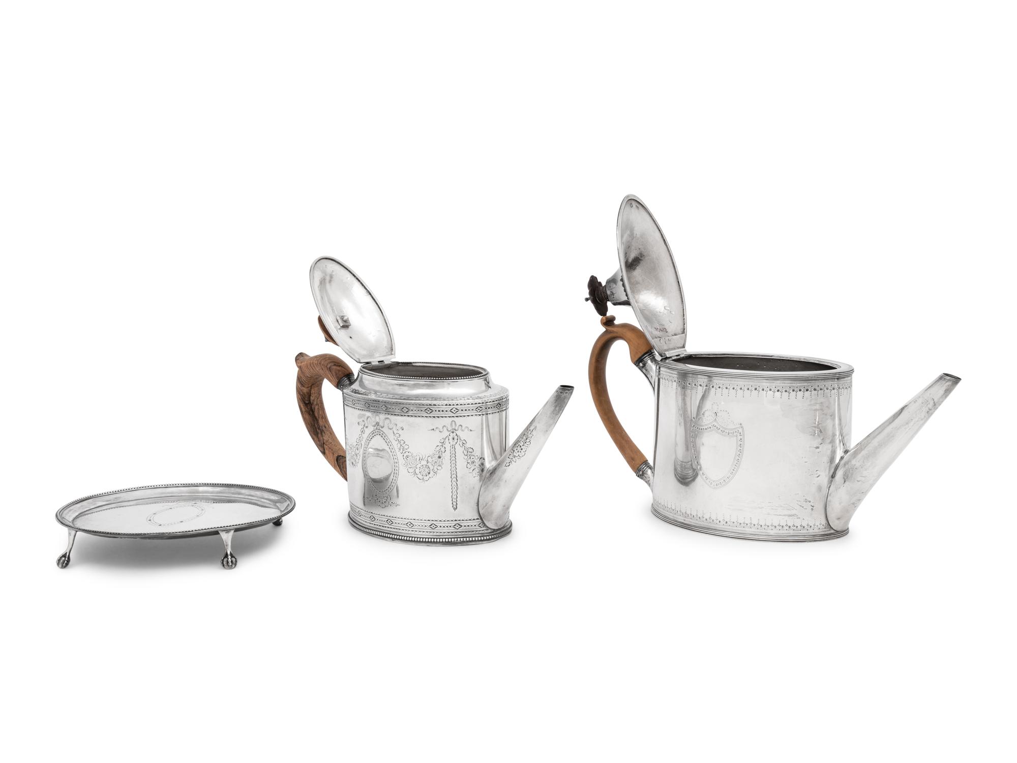 Two Hester Bateman George III Silver Teapots and a Teapot Stand